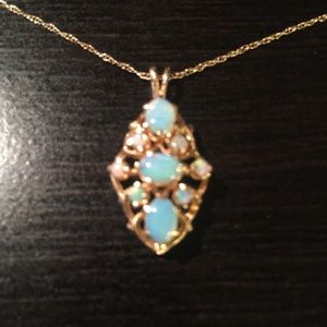14 k Gold chain and Opal pendant.